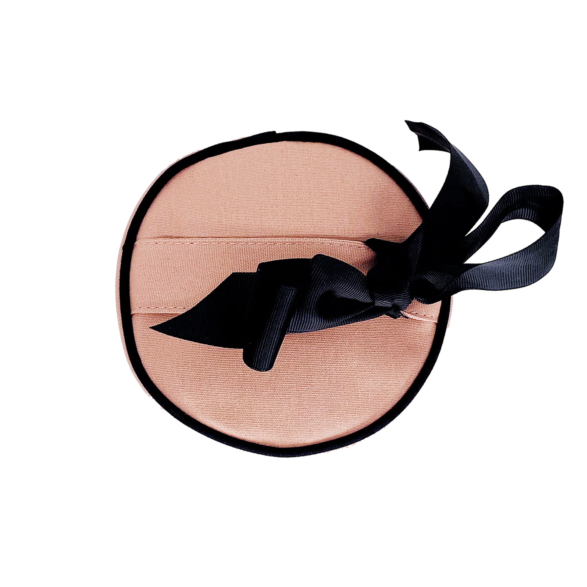 Bag-all Round Skin Care Case with Handle in pink blush featuring black trim and decorative bow, stylish cylindrical travel organizer for beauty products