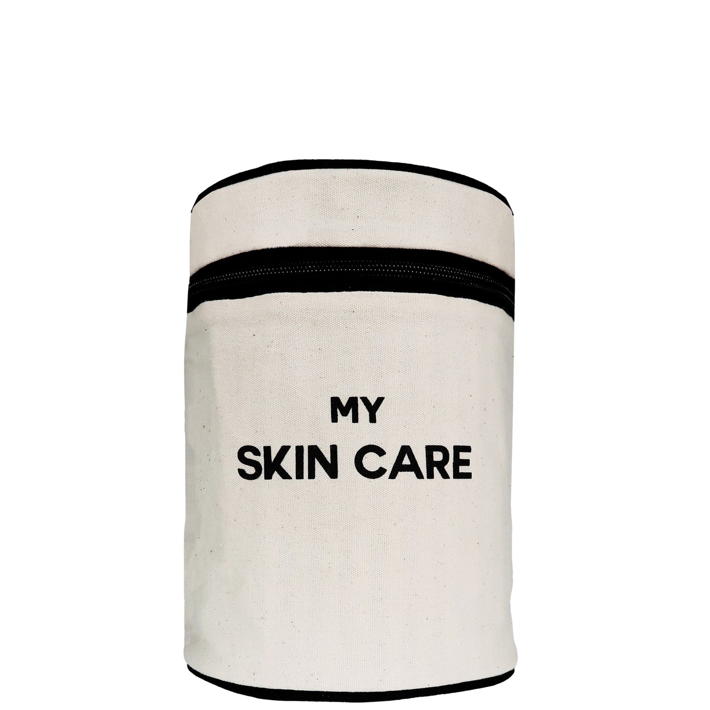 Bag-all Round My Skin Care Case in cream canvas with black trim, featuring cylindrical design and bold text, perfect for organizing beauty products