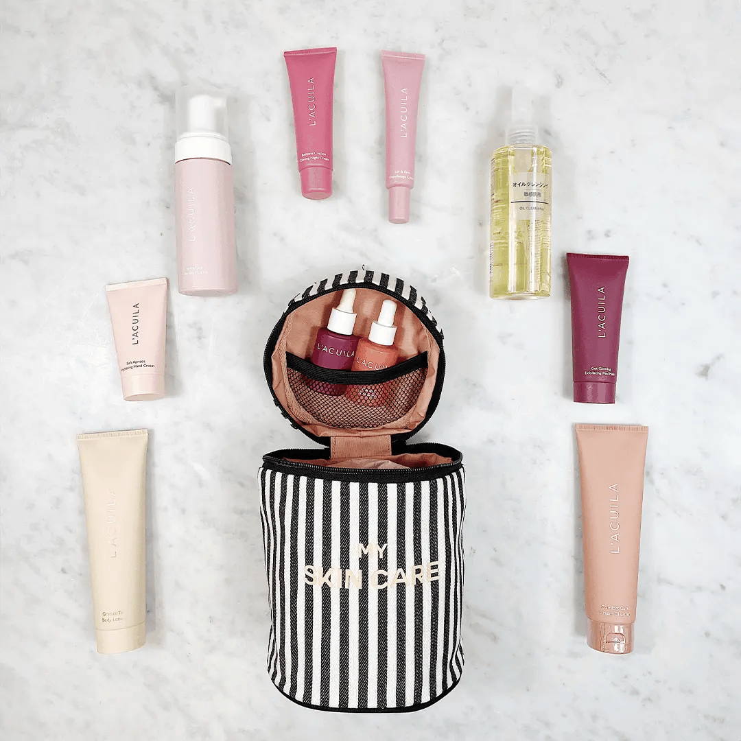 Striped Bag-all Travel Beauty Deal Gift Set with 3-pack toiletry and skincare organizers neatly arranged on marble surface