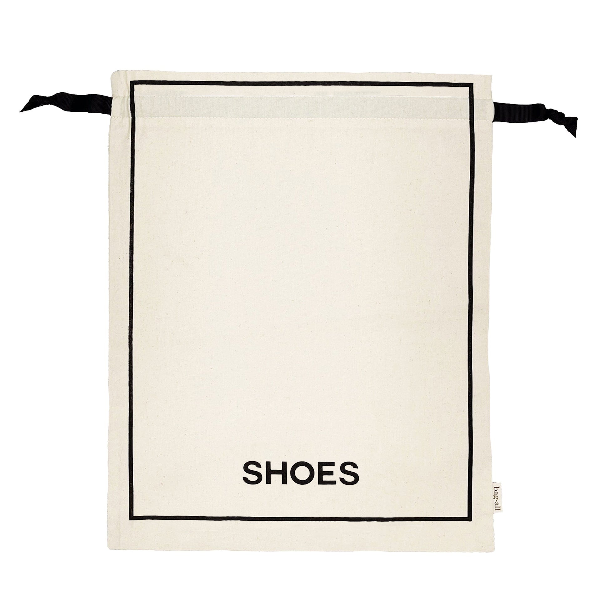 Bag-all Couture Shoe Travel Bag in cream canvas with black border trim and SHOES text print, featuring drawstring closure and eco-friendly water-based ink