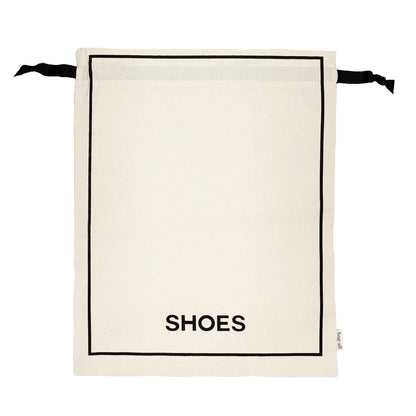 Bag-all Couture Shoe Travel Bag in cream canvas with black border trim and SHOES text print, featuring drawstring closure and eco-friendly water-based ink
