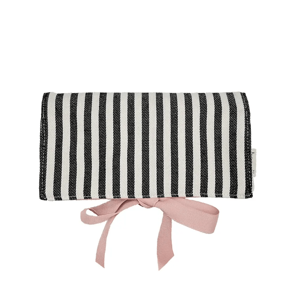 Striped black and white Couture Jewelry Roll with pink tie closure by Bag-all on white background