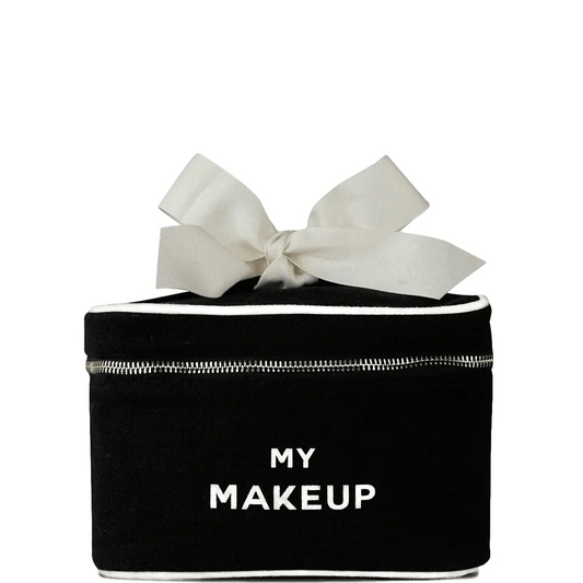 Black My Makeup Cosmetic Box with white printed “My Makeup” text, featuring a structured rectangular shape, silver zipper closure, white piping detail, and a large cream fabric bow on top, shown on a clean white background.
