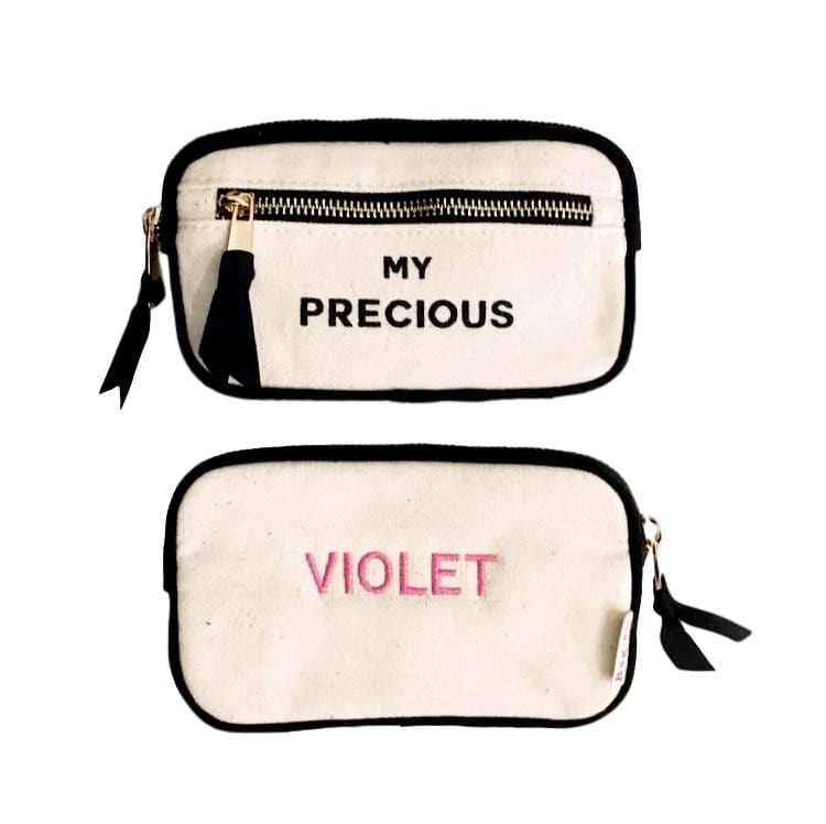 Caprice bag labeled "my precious" and on the back "violet" is monogrammed.