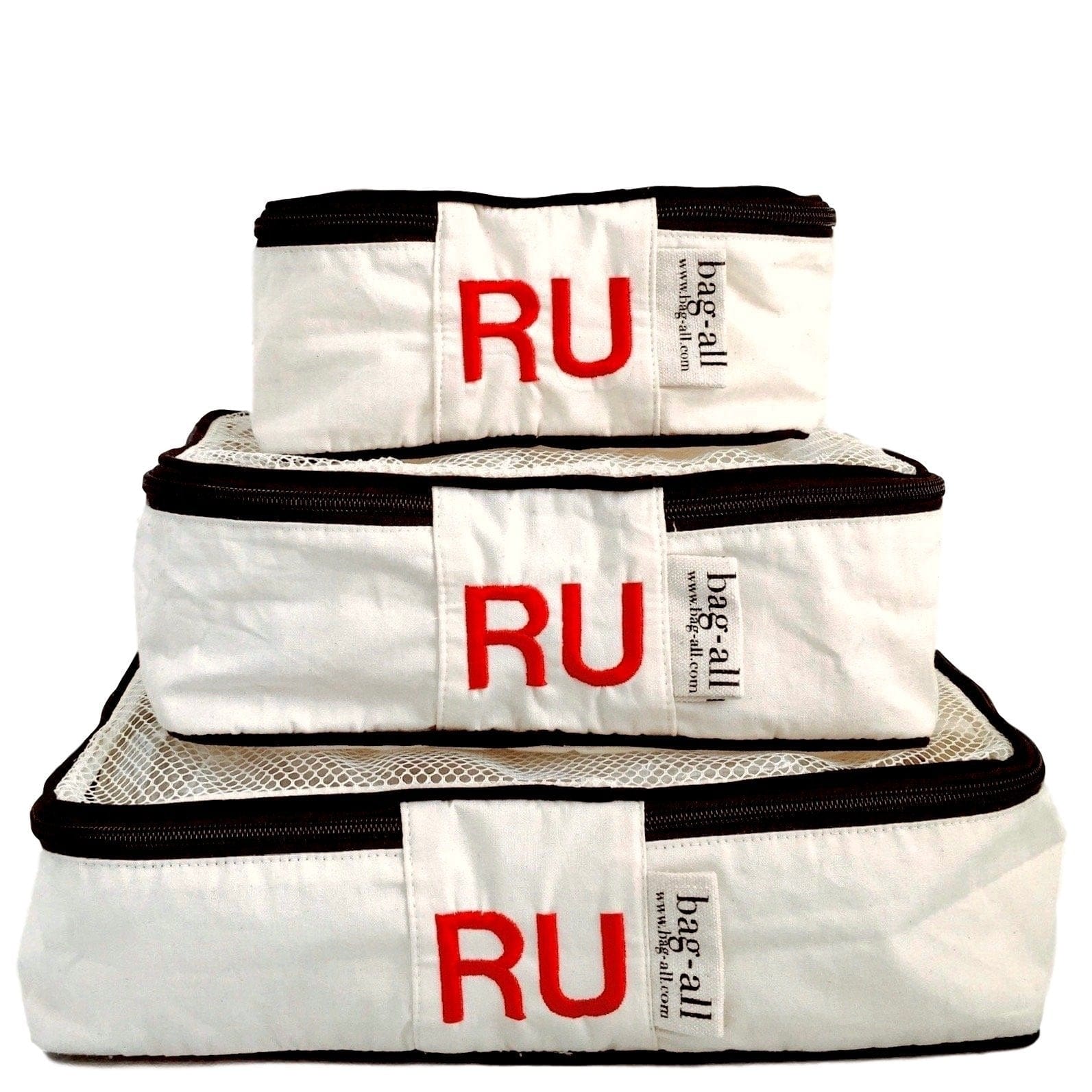 White packing cubes with "RU" monogrammed on the back. 