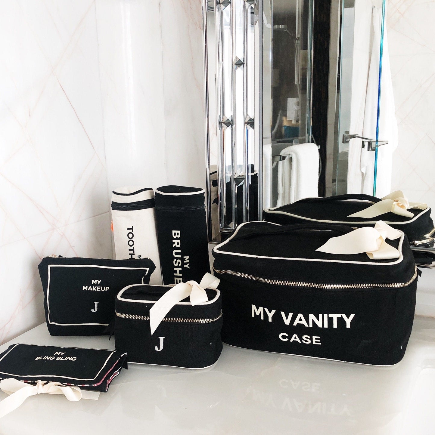 
                                      
                                        Toothbrush case, brushes case, makeup case and a vanity train case. 
                                      
                                    