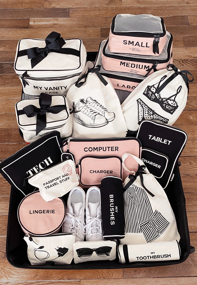 
                                      
                                        Bag-all products packed into a suitcase
                                      
                                    