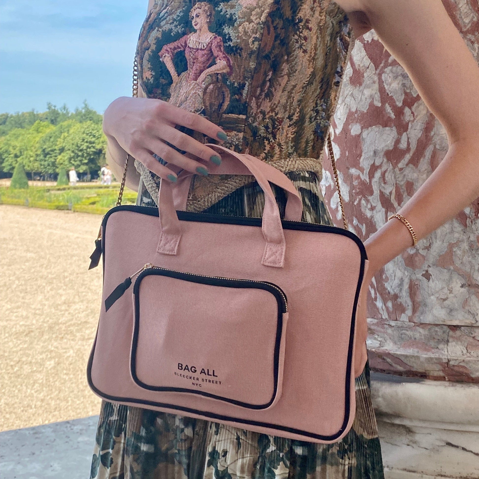 Bag-all Laptop Case 13 inch in blush pink cotton with handle and charger pocket, featuring padded striped lining and front storage compartment for professional organization