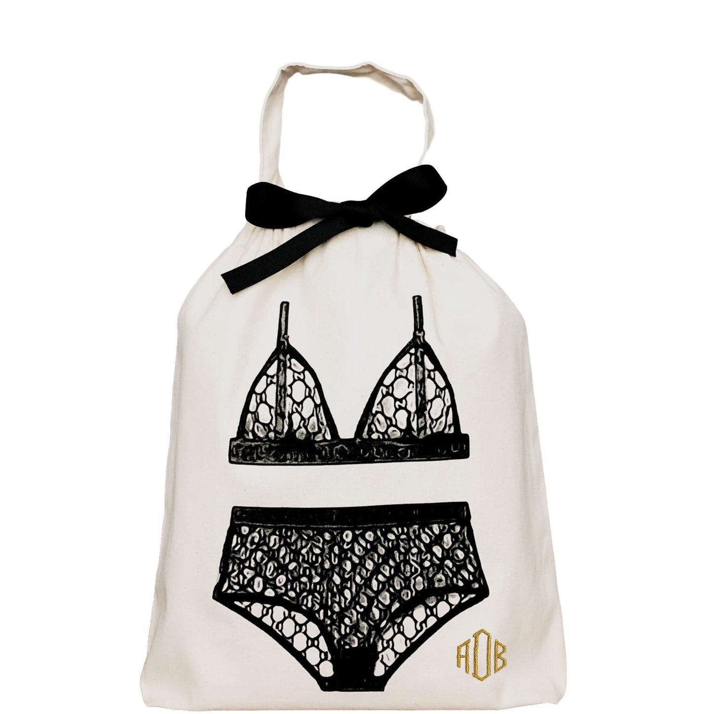 
                                      
                                        London lingerie bag with "ADB" printed on the front. 
                                      
                                    