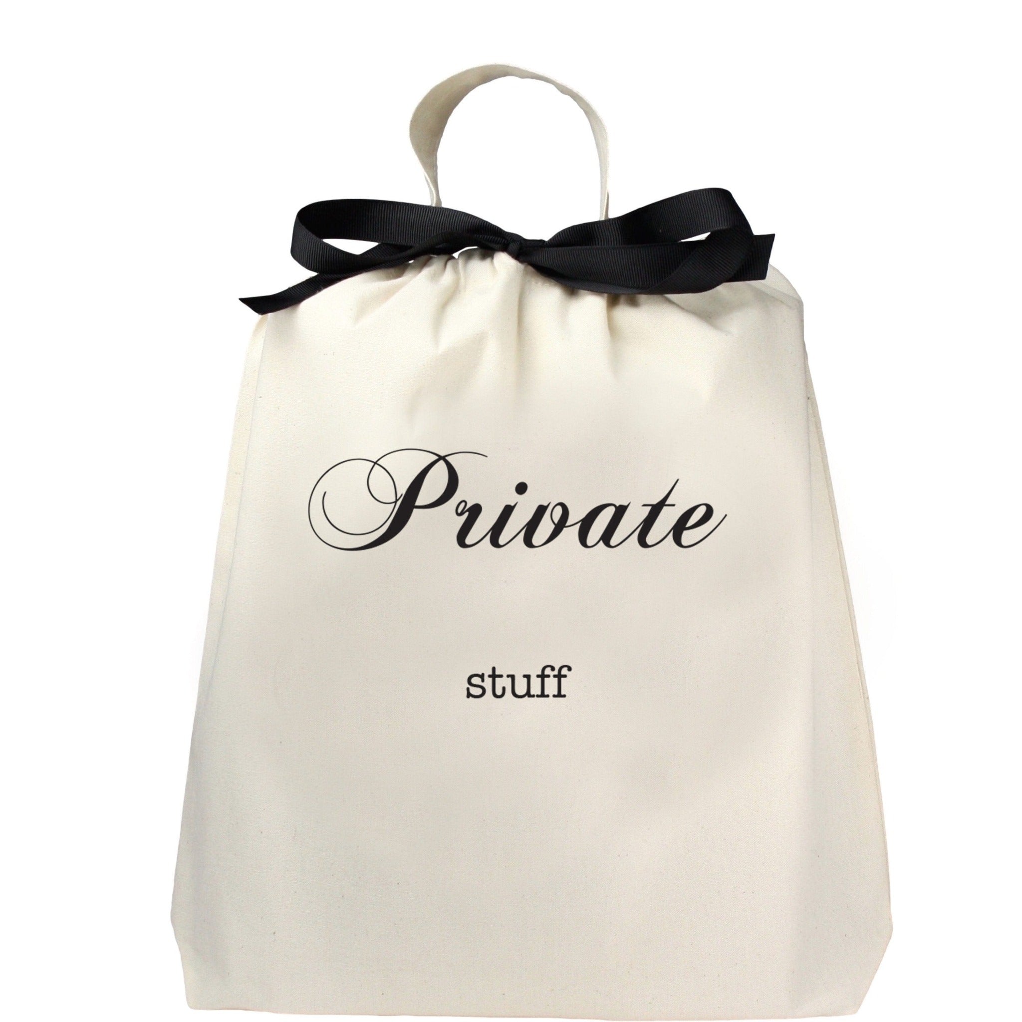 "Private Stuff" printed on front of bag with handle and black ribbon 