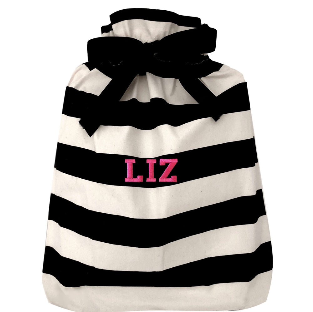 
                                      
                                        A large reusable gift bag with black and white horizontal stripes. 
                                      
                                    