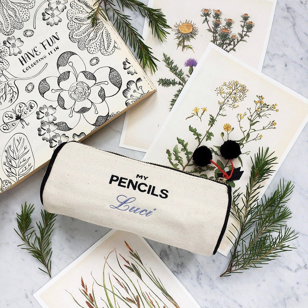 
                                      
                                        Pencil case in white with "My Pencils" printed on the front. 
                                      
                                    