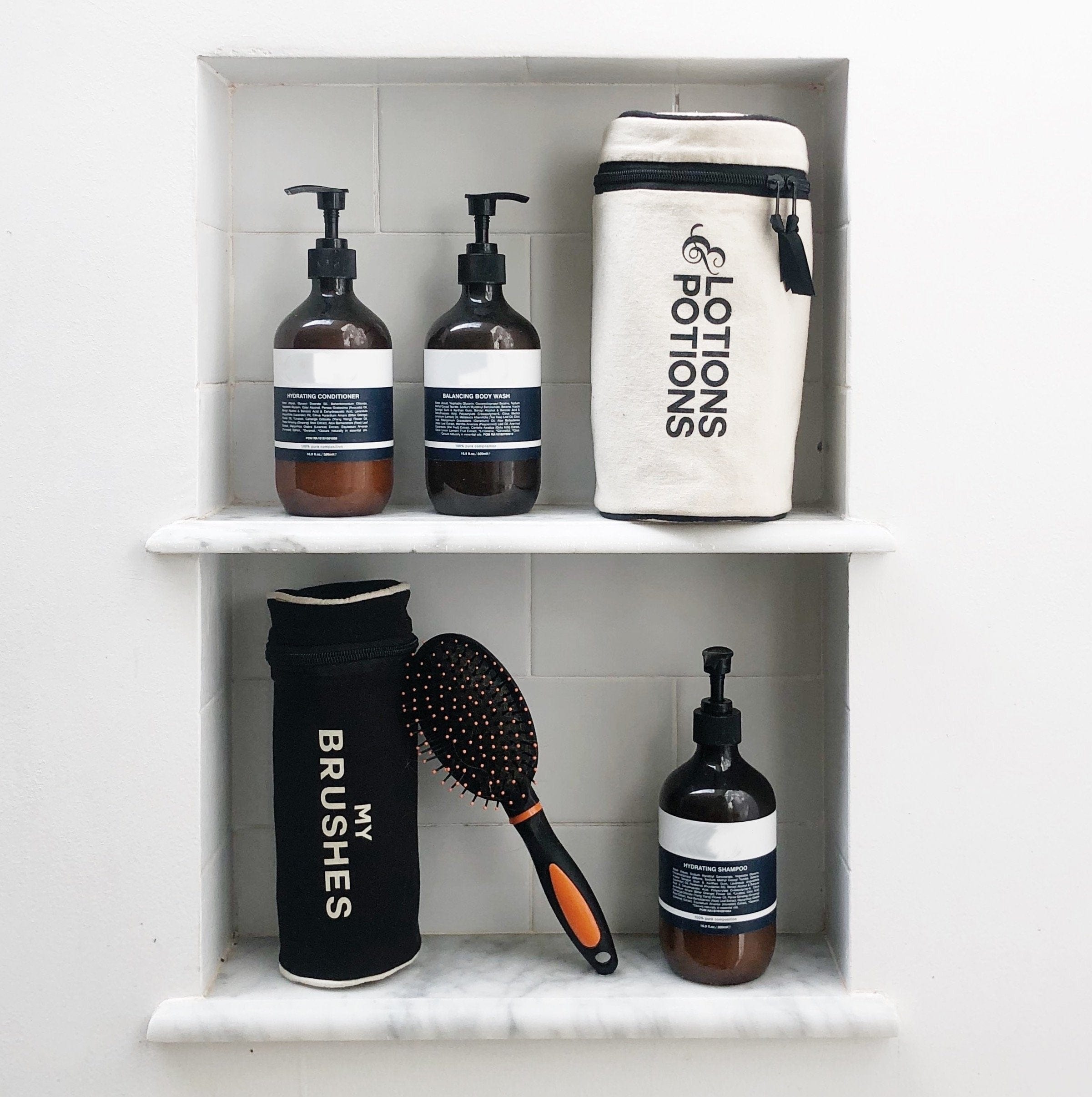 Bathroom with lotions case and brushes case. 