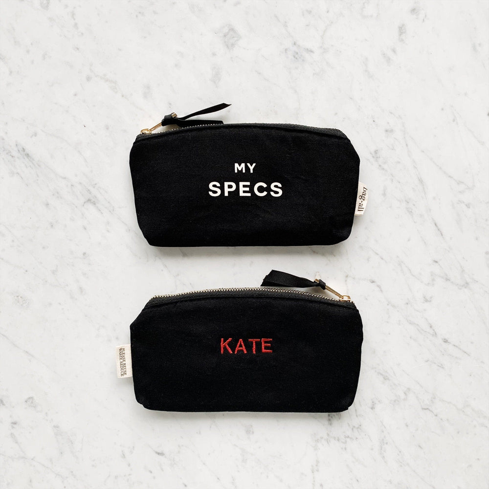 
                                      
                                        "KATE" monogrammed on bag in classic font
                                      
                                    