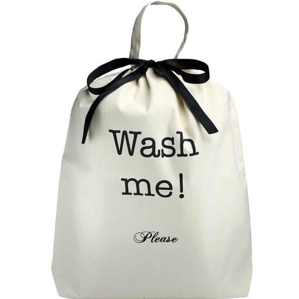 Laundry bag with "wash me" on the front