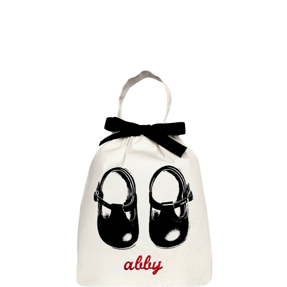 Baby shoe bag with "abby" monogrammed on the front. 