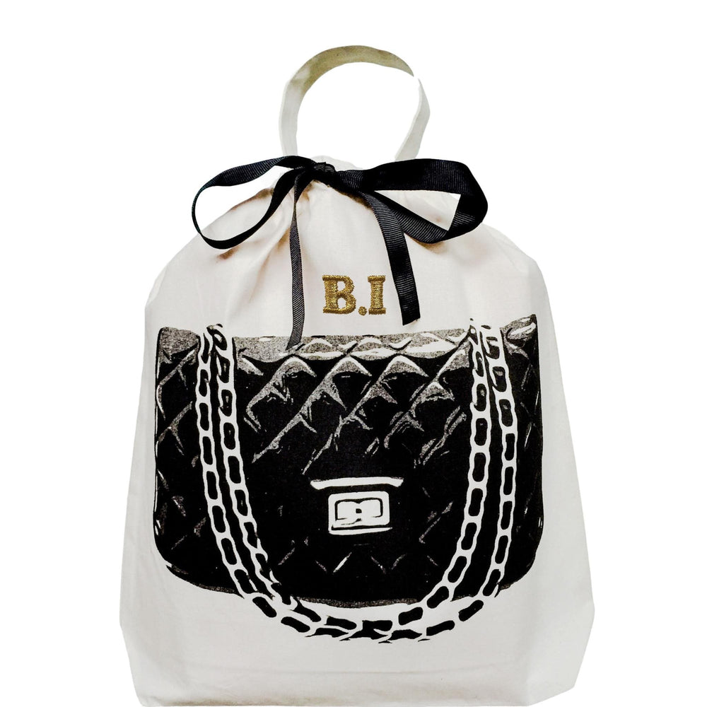 
                                      
                                        A handbag dust bag for travel with a quilted bag printed on the front. 
                                      
                                    