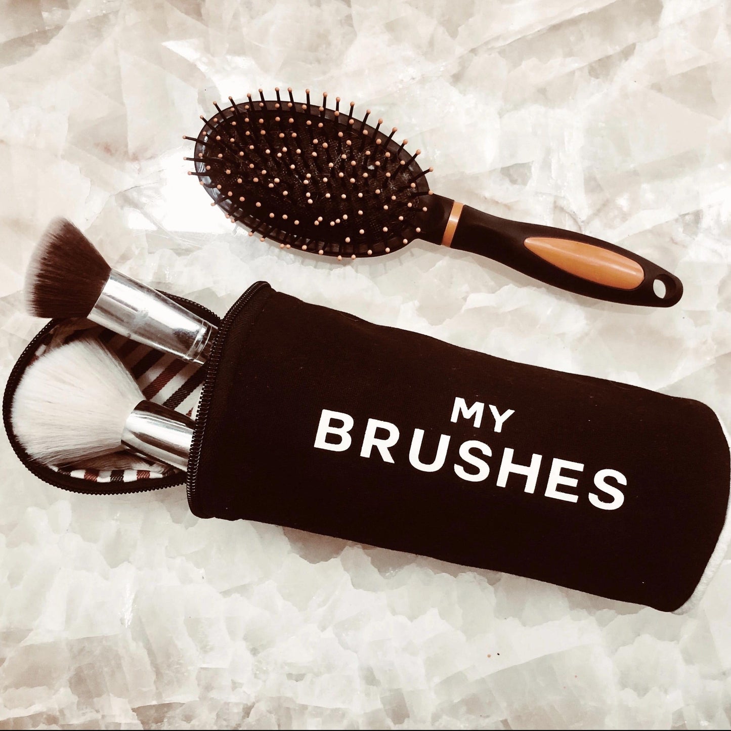 
                                      
                                        My brushes case with makeup brushes inside. 
                                      
                                    